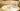beautifully wrapped wedding gifts with white paper and brown string
