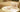 beautifully wrapped wedding gifts with white paper and brown string