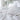 White st geneve down comforter and pillows on a bed in a softly lit room