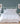 st geneve lajord duvet on bed beside table with white lamp