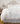 st geneve salzburg duvet on bed beside chair with books stacked on it